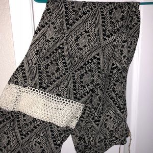 Black patterned pants with lace detailing